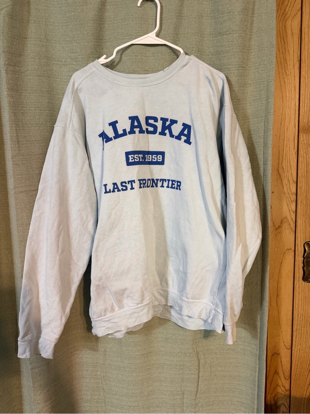 Comfort Colors Light Blue Crewneck Sweatshirt with Navy Alaska Graphic